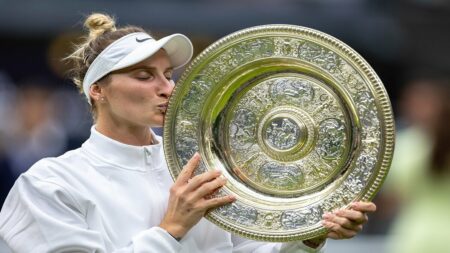 Czech Republic’s Marketa Vondrousova with the coveted Venus Rosewater Dish after beating Tunisia’s Ons Jabeur in the Wimbledon final on Saturday.