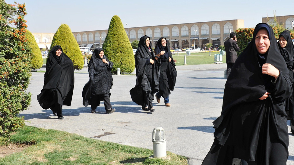 Women in Iran wearing hijab and keeping their heads covered