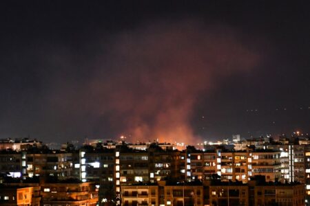 Illustrative: Smoke billows following an alleged Israeli airstrike south of Damascus, Syria, on July 20, 2020. (AFP)