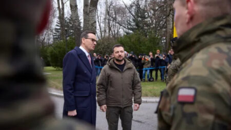 Ukrainian President Volodymyr Zelenskyy and Polish Prime Minister Mateusz Morawiecki speak to Polish soldiers earlier this year