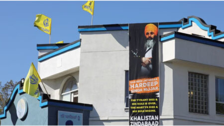 A sign in tribute of slain Sikh leader and Khalistan campaigner Hardeep Singh Nijjar, outside the Guru Nanak Sikh Gurudwara in Surrey, BC, Canada