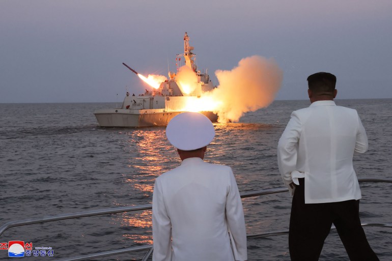 In an undated photo released by North Korea's Korean Central News Agency (KCNA) on August 21, 2024, Kim Jong Un, the leader of North Korea, supervises a tactical cruise missile test from a naval warship.