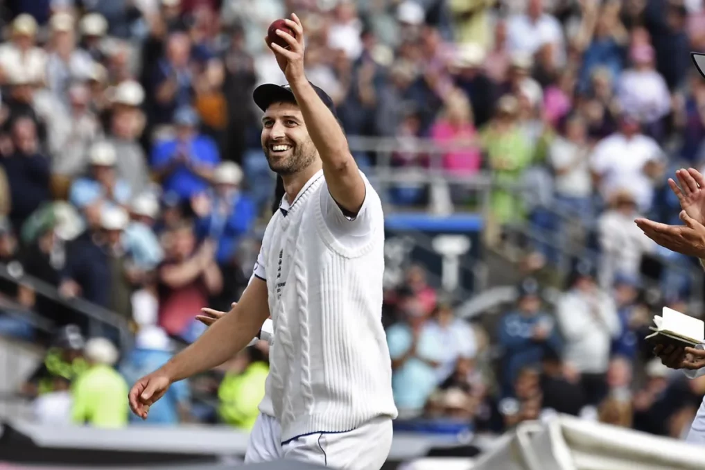 Mark Wood Uphoald the ball to celebrate his five-for.