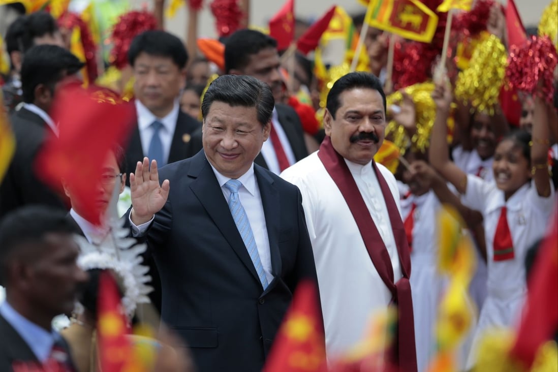 China’s President Xi Jinping pictured with Mahinda Rajapaksa