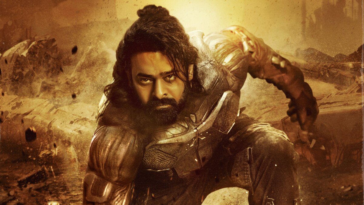 Prabhas as a futuristic warrior, standing in a dystopian world in the first look poster of kalki 2898 ad.