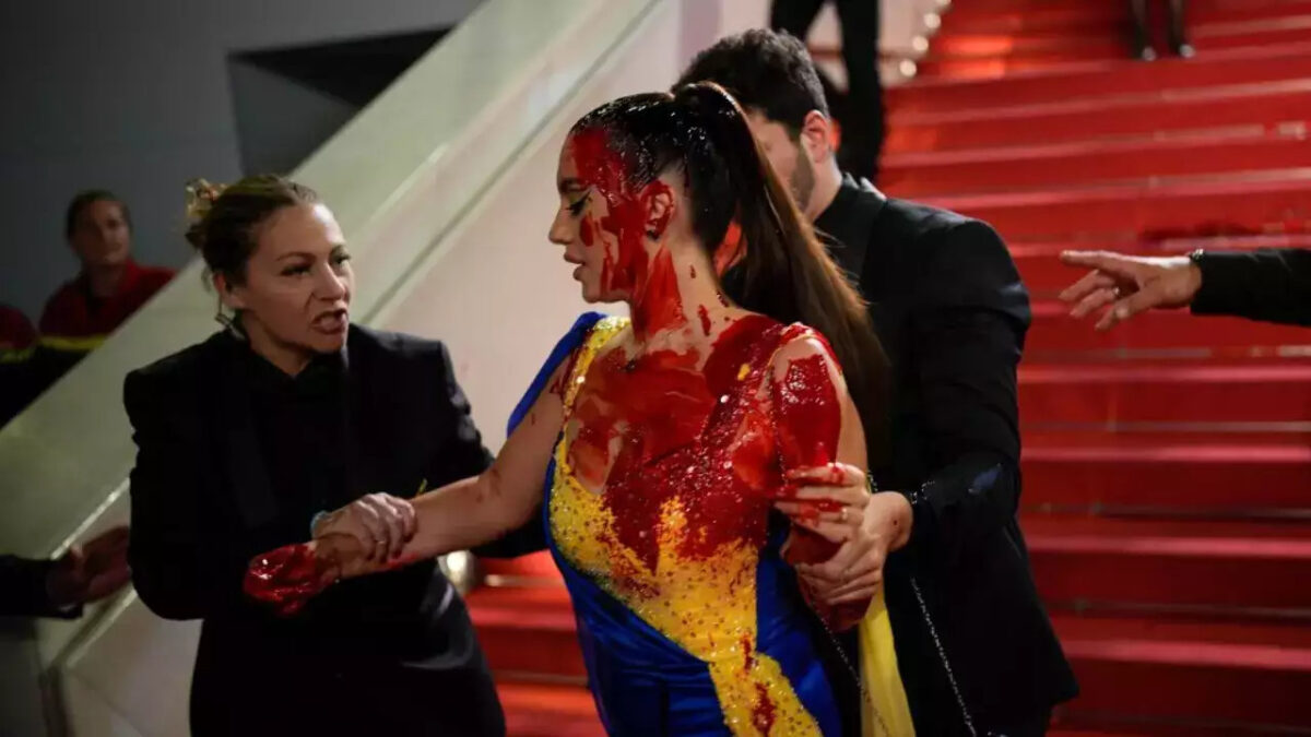 Ukrainian Protestor's Fake Blood Deluge Shocks Cannes 2024 - Asiana Times