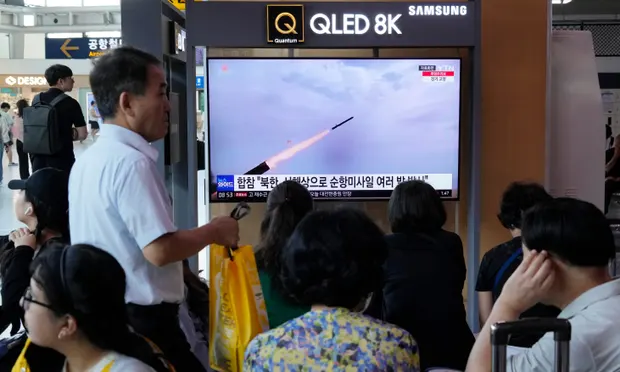 Missile launch watched by citizens