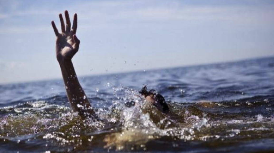 Death in Global commons : Image of person drowning at sea 