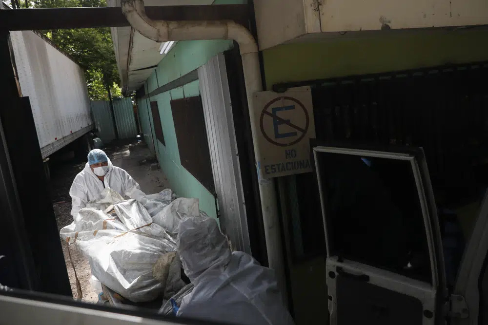 Bodies from the Women's Prison being brought to the Morgue. Image Source - AP Photo/Elmer Martinez