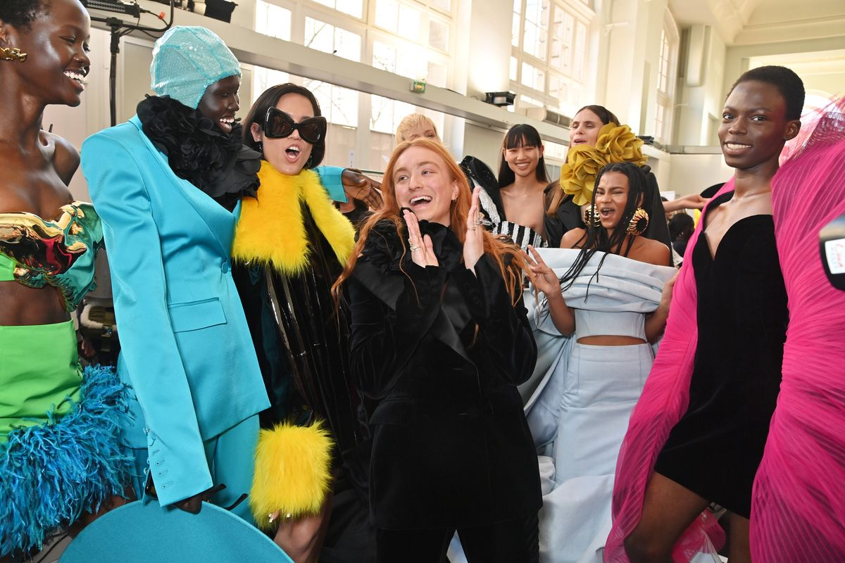 Harris Reed backstage with his models