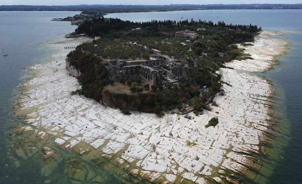 Italy’s Lake Garda shrinks to a near-historic low amid the drought.