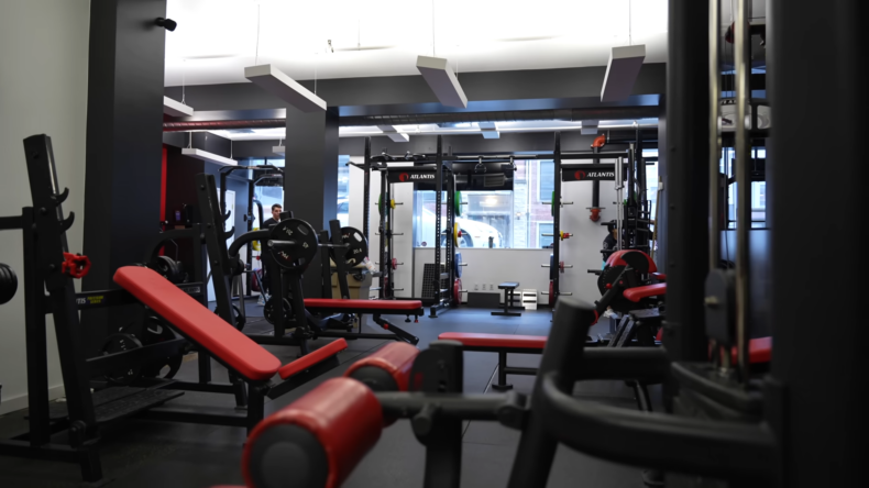 Modern Gym Interior with A Variety of Workout Equipment, Highlighting a Professional Fitness Environment